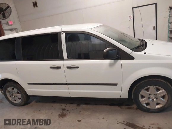 2014 Ram Cargo Van Tradesman with VIN 2C4JRGAG9ER186052, listed as a IAAI auction lot 41879655 with 239,442 mi miles. Bid and sale history available at carsss.com. Image 13.