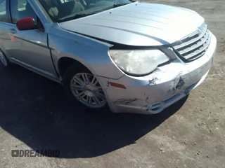 2008 Chrysler Sebring Touring with VIN 1C3LC56K78N275328, listed as a IAAI auction lot 41811526 with 195,457 mi miles and . Bid and sale history available at DreamBid. Image 6.