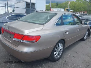 2006 Hyundai Azera SE with VIN KMHFC46FX6A125848, listed as a IAAI auction lot 42195041 with 147,596 mi miles and . Bid and sale history available at DreamBid. Image 4.
