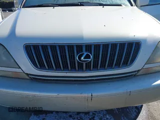 1999 Lexus RX 300 Luxury SUV with VIN JT6HF10U3X0052413, listed as a IAAI auction lot 41404927 with 211,660 mi miles. Bid and sale history available at carsss.com. Image 6.