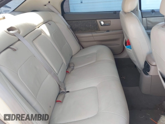 2002 Mercury Sable LS Premium with VIN 1MEFM55S52A649004, listed as a IAAI auction lot 41886997 with 314,745 mi miles and . Bid and sale history available at DreamBid. Image 8.