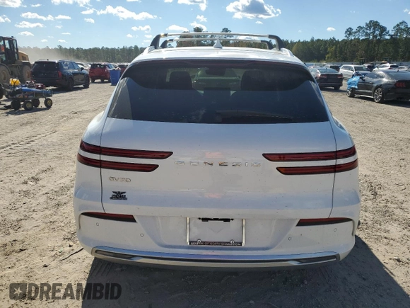 2024 Genesis GV70 Advanced with VIN 5NMMCET16RH003248, listed as a Copart auction lot 82125824 with 6,210 mi miles and Salvage title. Bid and sale history available at DreamBid. Image 6.
