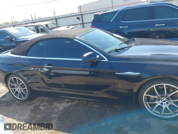 2012 BMW 6 Series 650i with VIN WBALZ3C53CC397604, listed as a IAAI auction lot 41881996 with 96,175 mi miles and . Bid and sale history available at carsss.com. Image 13.