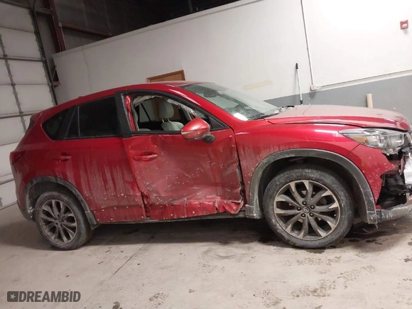2016 Mazda CX-5 Grand Touring with VIN JM3KE4DY8G0622347, listed as a IAAI auction lot 41618997 with NaN miles. Bid and sale history available at carsss.com. Image 14.