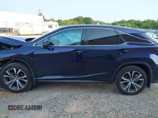 2022 Lexus RX 350 with VIN 2T2HZMAA5NC232352, listed as a IAAI auction lot 42399381 with 13,359 mi miles and . Bid and sale history available at DreamBid. Image 14.
