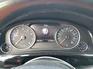 2012 Volkswagen Touareg Sport z VIN WVGEF9BP7CD006020, wystawiony jako Copart lot #88211145 z przebiegiem 180 729 mil mil oraz Szkoda całkowita • Salvage title. Historia ofert i sprzedaży dostępna na DreamBid. Obrazek 9.