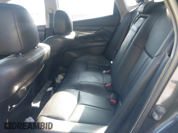 2015 Infiniti Q70 with VIN JN1BY1AR0FM562523, listed as a IAAI auction lot 41310831 with 73,870 mi miles and . Bid and sale history available at DreamBid. Image 8.