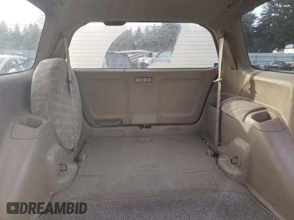 1998 Honda Odyssey with VIN RA31038664, listed as a Copart auction lot 43051785 with 106,084 mi miles and Salvage title. Bid and sale history available at DreamBid. Image 10.