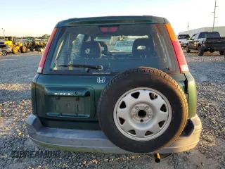 2000 Honda CR-V LX with VIN JHLRD1848YC038520, listed as a Copart auction lot 74137634 with 104,332 mi miles and Salvage Title. Bid and sale history available at carsss.com. Image 6.
