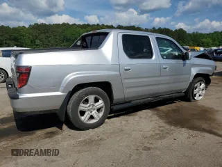 2014 Honda Ridgeline RTL with VIN 5FPYK1F57EB002835, listed as a Copart auction lot 54748905 with 111,253 mi miles and Salvage title. Bid and sale history available at DreamBid. Image 3.