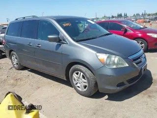 2007 Honda Odyssey EX-L with VIN 5FNRL38797B137595, listed as a IAAI auction lot 42002233 with 192,296 mi miles. Bid and sale history available at carsss.com. Image 1.