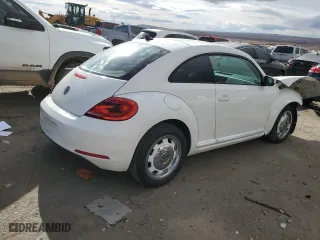 2012 Volkswagen Beetle 2.5L PZEV with VIN 3VWJP7AT1CM630089, listed as a Copart auction lot 82707554 with 79,617 mi miles and Salvage Title. Bid and sale history available at carsss.com. Image 3.