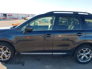 2015 Subaru Forester 2.5i Touring with VIN JF2SJAUC2FH827235, listed as a IAAI auction lot 41692229 with 182,123 mi miles. Bid and sale history available at carsss.com. Image 15.