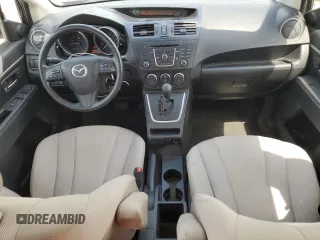 2015 Mazda 5 Sport с VIN JM1CW2BL4F0184530, выставлен на аукционе Copart как лот 56965755 с пробегом 144 873 миль миль и Списание • Salvage title. История ставок и продаж доступна на DreamBid. Изображение 8.