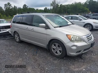 2008 Honda Odyssey Touring with VIN 5FNRL38958B016839, listed as a IAAI auction lot 42695613 with 260,909 mi miles and . Bid and sale history available at DreamBid. Image 1.