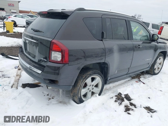 2014 Jeep Compass Limited with VIN 1C4NJDCB6ED549614, listed as a IAAI auction lot 41595768 with 114,472 mi miles. Bid and sale history available at carsss.com. Image 4.