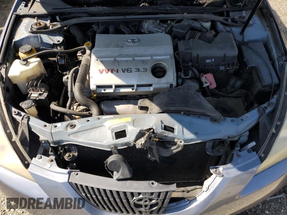 2006 Toyota Solara SE z VIN 4T1FA38P56U106015, wystawiony jako Copart lot #62425945 z przebiegiem Nie podano mil oraz Nie do naprawy • Non repairable. Historia ofert i sprzedaży dostępna na DreamBid. Obrazek 11.