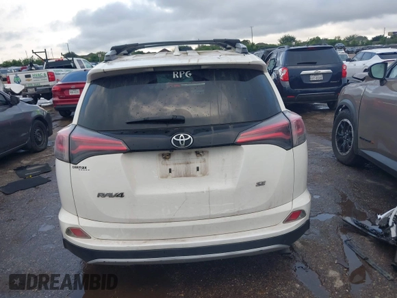 2016 Toyota RAV4 SE with VIN 2T3NFREV6GW262348, listed as a IAAI auction lot 42074087 with 114,791 mi miles and . Bid and sale history available at DreamBid. Image 16.