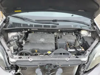 2012 Toyota Sienna SE z VIN 5TDXK3DC2CS199701, wystawiony jako Copart lot #50316225 z przebiegiem 212 383 mil mil oraz Szkoda całkowita • Salvage title. Historia ofert i sprzedaży dostępna na DreamBid. Obrazek 12.