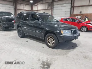 2003 Jeep Grand Cherokee Laredo with VIN 1J4GW48S63C552366, listed as a IAAI auction lot 41861501 with 227,464 mi miles. Bid and sale history available at carsss.com. Image 1.