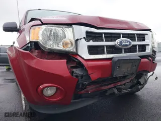 2011 Ford Escape XLT with VIN 1FMCU9D77BKB34262, listed as a IAAI auction lot 41198534 with 212,006 mi miles. Bid and sale history available at carsss.com. Image 6.