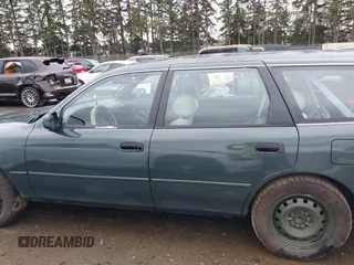 1996 Toyota Camry LE z VIN 4T1EF12K9TU116427, wystawiony jako IAAI lot #38696498 z przebiegiem 242 599 mil mil oraz . Historia ofert i sprzedaży dostępna na DreamBid. Obrazek 13.