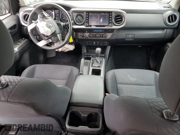 2021 Toyota Tacoma SR z VIN 3TYCZ5AN3MT046066, wystawiony jako Copart lot #54785665 z przebiegiem 57 897 mil mil oraz Szkoda całkowita • Salvage title. Historia ofert i sprzedaży dostępna na DreamBid. Obrazek 8.