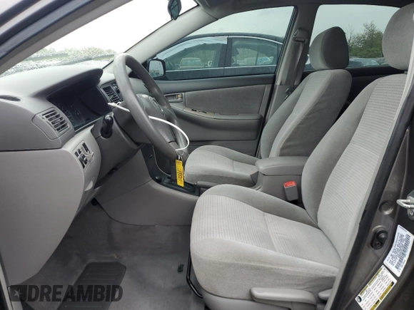 2006 Toyota Corolla CE z VIN 1NXBR32E76Z701995, wystawiony jako Copart lot #57660565 z przebiegiem 121 437 mil mil oraz Szkoda całkowita • Salvage title. Historia ofert i sprzedaży dostępna na DreamBid. Obrazek 7.