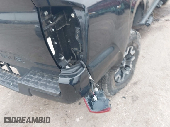2021 Toyota Tacoma SR z VIN 5TFAX5GNXMX193978, wystawiony jako IAAI lot #41595827 z przebiegiem 43 999 mil mil oraz . Historia ofert i sprzedaży dostępna na DreamBid. Obrazek 6.