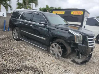 2018 Cadillac Escalade Premium Luxury with VIN 1GYS4CKJ3JR305195, listed as a Copart auction lot 43159425 with 147,077 mi miles and Salvage Title. Bid and sale history available at carsss.com. Image 4.
