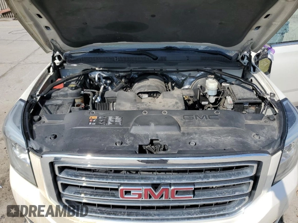 2015 GMC Yukon XL SLT with VIN 1GKS2HKC8FR259966, listed as a Copart auction lot 50410195 with 158,367 mi miles and Salvage Title. Bid and sale history available at carsss.com. Image 14.