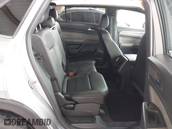 2023 Volkswagen Atlas SE z VIN 1V2HE2CA0PC222291, wystawiony jako IAAI lot #42431536 z przebiegiem 23 114 mil mil oraz . Historia ofert i sprzedaży dostępna na DreamBid. Obrazek 8.