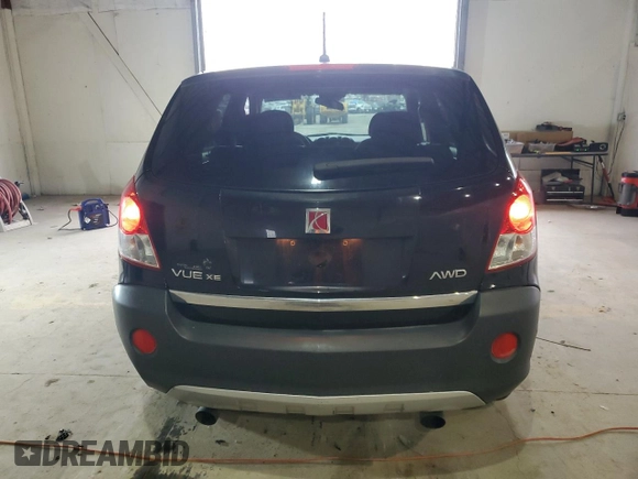 2009 Saturn VUE XE z VIN 3GSDL43N79S609183, wystawiony jako Copart lot #52552385 z przebiegiem 140 404 mil mil oraz Szkody całkowita. Historia ofert i sprzedaży dostępna na DreamBid. Obrazek 6.