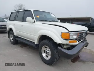1997 Toyota Land Cruiser z VIN JT3HJ85JXV0163427, wystawiony jako IAAI lot #41747395 z przebiegiem 248 473 mil mil oraz . Historia ofert i sprzedaży dostępna na DreamBid. Obrazek 1.