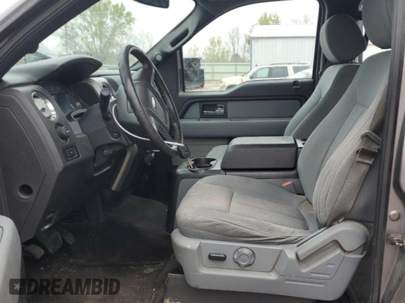 2014 Ford F-150 XL with VIN 1FTFW1EF4EKF02873, listed as a Copart auction lot 52884345 with 326,296 mi miles and Salvage Title. Bid and sale history available at carsss.com. Image 7.