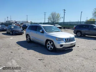 2011 Jeep Grand Cherokee Overland with VIN 1J4RR6GT6BC568491, listed as a IAAI auction lot 42035464 with 147,389 mi miles. Bid and sale history available at carsss.com. Image 1.