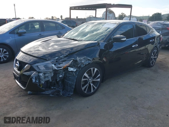 2018 Nissan Maxima SV with VIN 1N4AA6AP4JC398478, listed as a IAAI auction lot 41619733 with 132,867 mi miles and . Bid and sale history available at DreamBid. Image 2.