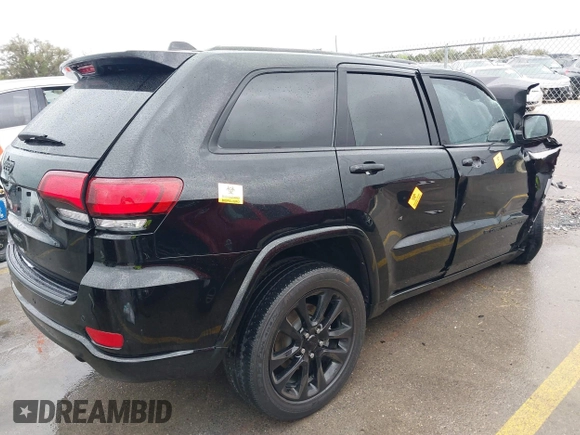 2022 Jeep Grand Cherokee Laredo X with VIN 1C4RJEAG3NC154723, listed as a IAAI auction lot 41890411 with Not provided miles and . Bid and sale history available at DreamBid. Image 4.