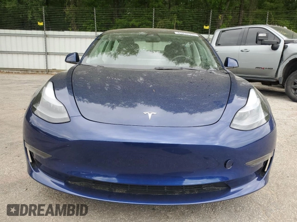 2023 Tesla Model 3 with VIN 5YJ3E1EA5PF695318, listed as a Copart auction lot 53832935 with 28,863 mi miles and Salvage title. Bid and sale history available at DreamBid. Image 5.