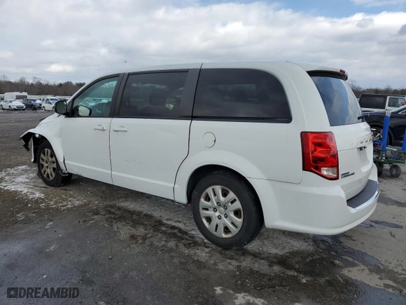 2018 Dodge Grand Caravan SE with VIN 2C4RDGBG0JR138255, listed as a Copart auction lot 45346165 with 99,859 mi miles and Salvage Title. Bid and sale history available at carsss.com. Image 2.