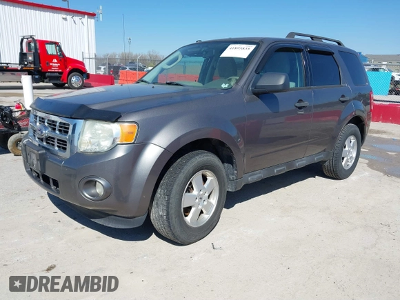 2011 Ford Escape XLT with VIN 1FMCU0D74BKA81385, listed as a IAAI auction lot 41895835 with 238,298 mi miles. Bid and sale history available at carsss.com. Image 17.