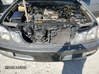 2002 Lexus LX 470 z VIN JTJHT00W723514716, wystawiony jako Copart lot #42646295 z przebiegiem 188 817 mil mil oraz Szkoda całkowita • Salvage title. Historia ofert i sprzedaży dostępna na DreamBid. Obrazek 11.
