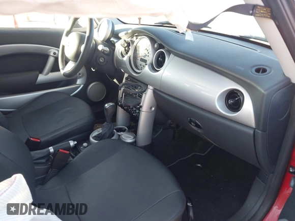 2005 MINI Hardtop with VIN WMWRC33455TJ66323, listed as a IAAI auction lot 41868311 with 122,398 mi miles and . Bid and sale history available at DreamBid. Image 5.