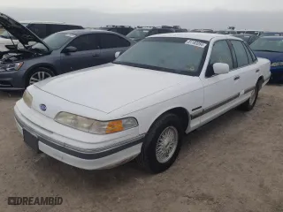 1992 Ford Crown Victoria LX with VIN 2FALP74W6NX244444, listed as a Copart auction lot 81193284 with 11,776 mi miles and Salvage Title. Bid and sale history available at carsss.com. Image 1.