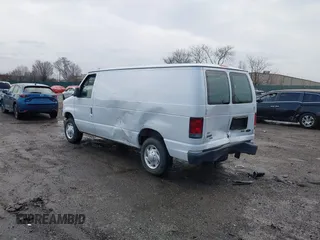 2013 Ford Econoline Cargo Commercial with VIN 1FTNE1EW2DDB11061, listed as a IAAI auction lot 41808318 with 230,677 mi miles. Bid and sale history available at carsss.com. Image 3.
