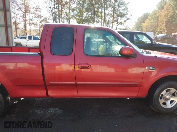 2000 Ford F-150 XL with VIN 1FTRX17L7YKA59717, listed as a IAAI auction lot 40887691 with 104,095 mi miles. Bid and sale history available at carsss.com. Image 13.