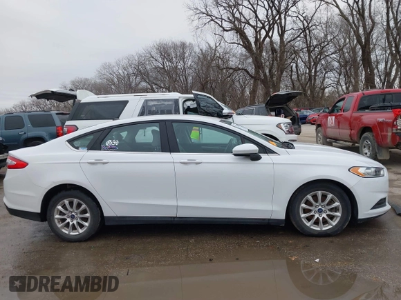 2015 Ford Fusion S with VIN 3FA6P0G70FR219905, listed as a IAAI auction lot 41228828 with 62,030 mi miles and . Bid and sale history available at carsss.com. Image 13.