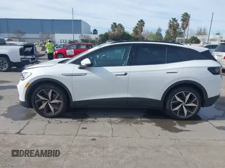 2023 Volkswagen ID.4 S z VIN 1V25MPE80PC043892, wystawiony jako IAAI lot #41669315 z przebiegiem 49 976 mil mil oraz . Historia ofert i sprzedaży dostępna na DreamBid. Obrazek 14.