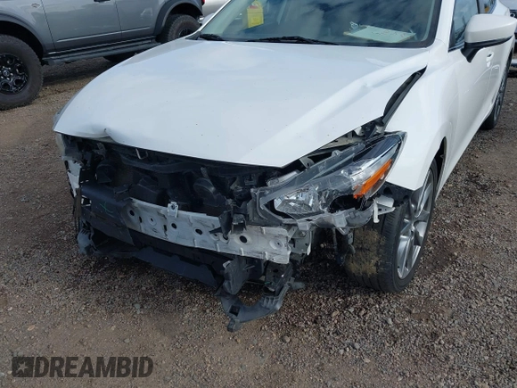 2018 Mazda 3 Touring with VIN 3MZBN1L31JM225108, listed as a IAAI auction lot 41959304 with 74,933 mi miles. Bid and sale history available at carsss.com. Image 6.