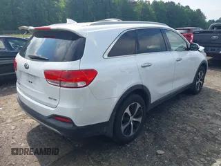2017 Kia Sorento EX with VIN 5XYPH4A59HG300957, listed as a IAAI auction lot 42215684 with 220,309 mi miles and . Bid and sale history available at DreamBid. Image 4.